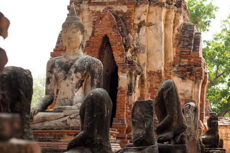 Ancient buddha statue in archaeological site at Wat Mahathat temple .の写真素材
