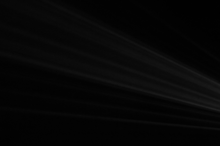 black and white color . projector beautiful spotlight . wide lens equipment for show presentation at night . smoke abstract background . digital monitor for multimedia teach .の写真素材