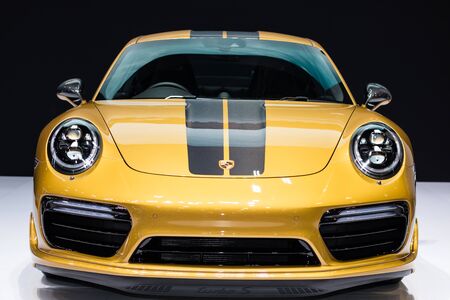 Nonthaburi , Thailand - April 7, 2018: front side view car bonnet . Porsche 911 GT3 color yellow and...