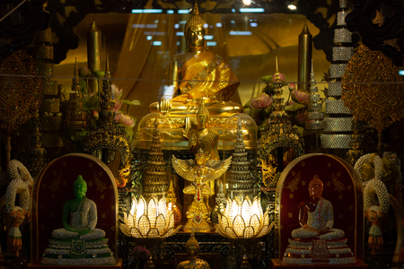 statue old buddha on shelf in temple at Ayutthaya Thailandの写真素材