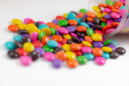 colorful sweet circle shape . sugar yummy balls candy in box on white background .の写真素材