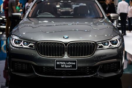 Nonthaburi , Thailand - April 7, 2018:  BMW M760Li xDrive M Sport . front side view car bonnet with light bulb led for car headlights . grey color luxury automobile in show room .のeditorial素材