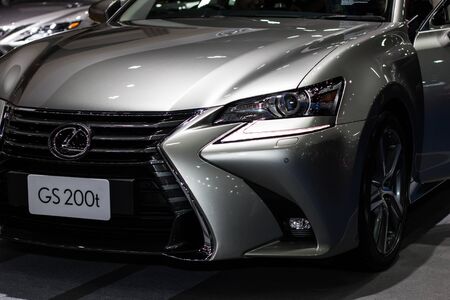 Nonthaburi ,Thailand-April7,2018:  Lexus GS 200t delivers turbo boosted performance in style and luxury . front side view car bonnet with light bulb led for car headlights . grey color autautomobile .のeditorial素材