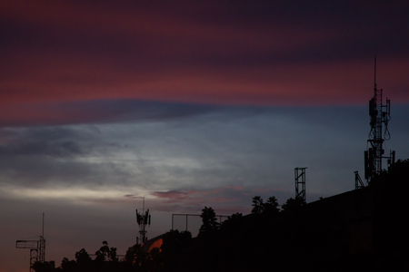 twilight sky at night beautiful color . and telecommunications antenna .の写真素材