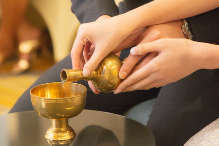 thai traditional holy water pouring .の写真素材