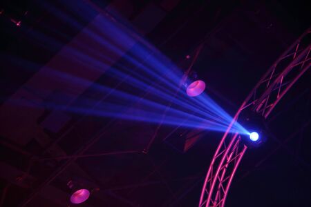 projector stage lighting . equipment for show presentation in night party . spotlight on smoke...