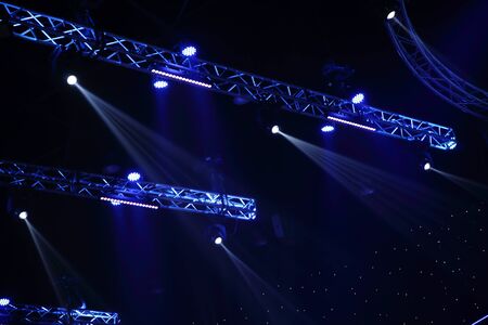 projector stage lighting . equipment for show presentation in night party . spotlight on smoke...
