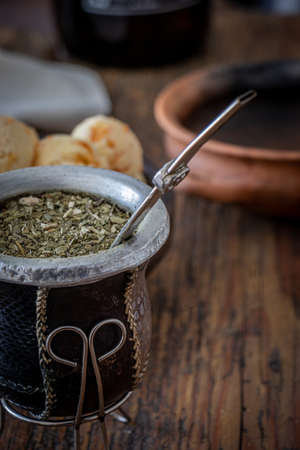 Argentine mate with Chipa on a wooden tableのeditorial素材