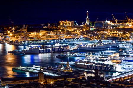 Aerial view of Genoa, Italy, the harbor with lantern (light house) by night / Genoa, October 27, 2016 Italy, Europeのeditorial素材