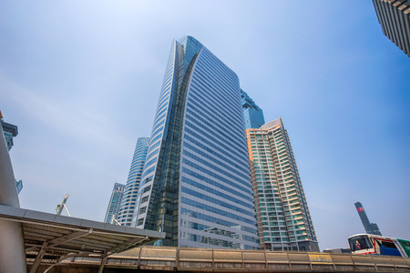Buildings and Train in Chong Nonsi BTS train station in Bangkok, Thailand