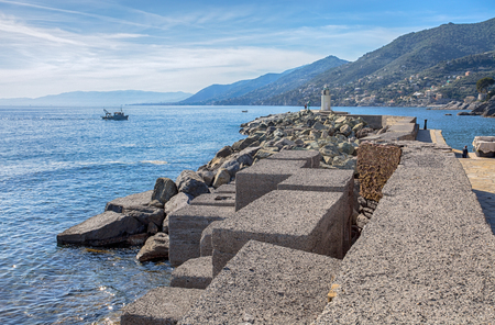 View of the lighthouse of city of Camogli, Genoa Province, Liguria, Mediterranean coast, Italyの写真素材