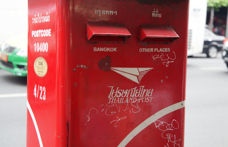 BANGKOK, THAILAND, JANUARY 9 ,2019 - Thailand post letterbox along street, red mailbox to send to Bangkok and other places.のeditorial素材