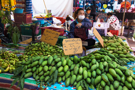 SAKON NAKHON, THAILAND FEBRUARY 2, 2019 - Green mango on sale at the market in Sakon, Nakhon, Thailand.のeditorial素材