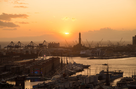 GENOA, ITALY, NOVEMBER  5, 2019 - Aerial view of Genoa, Italy at sunset, the harbor with the Lanterna, the lighthouse,  symbol of the city,  Italy.のeditorial素材