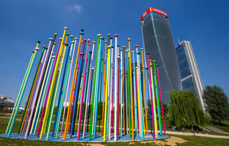 MILAN, ITALY JUNE 15, 2021 - "Tre Torri" complex buildings in City Life District and Coloris (Pascale Marthine Tayou) sculpture in Milan, Italyのeditorial素材