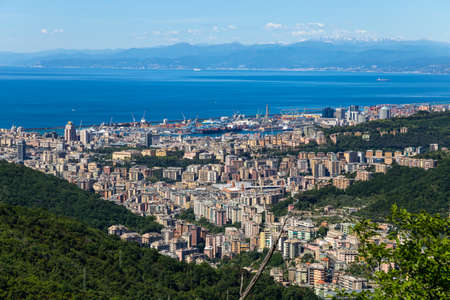 Overview of the city of Genoa and its port in a sunny day, Italy.の写真素材