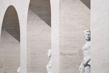 Squared colosseum detail with marble statue - Eur zone - Rome Italy.の写真素材