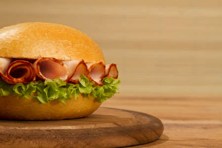 Crisp bred on wodden dish on a table low angleの写真素材