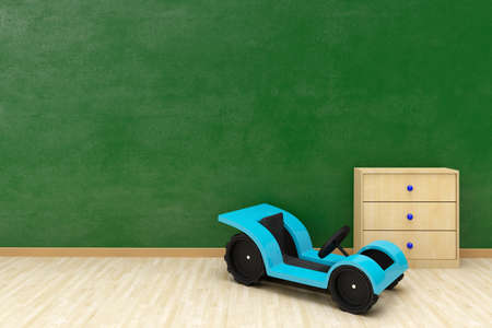 Green wall with toy car and copy space wooden floor