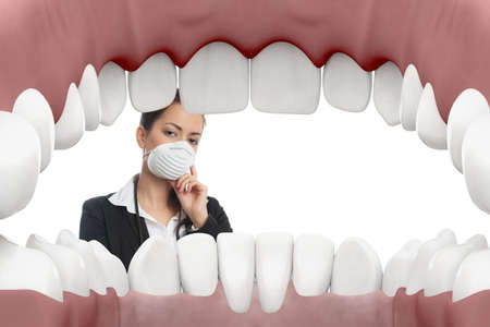 Female dentist looking into mouth with white background