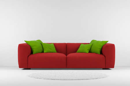 Red couch with carpet and green pillows