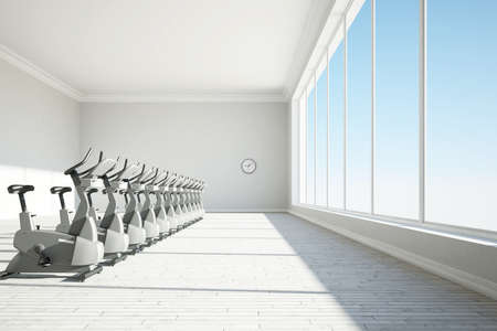 Gym with big windows and clock conceptの写真素材