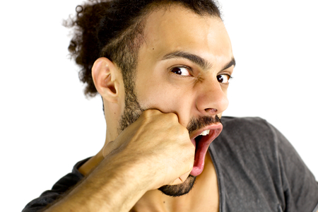 Cool young man getting hit by a fist