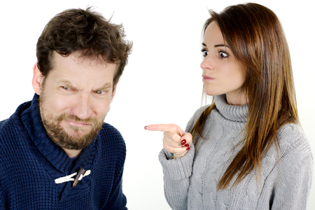 Unhappy young wife with bad husbandの写真素材