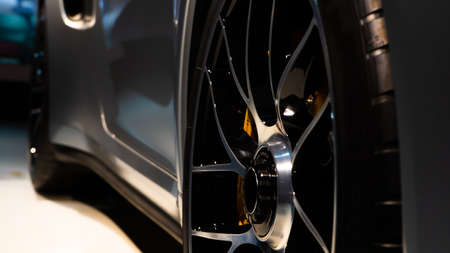 Silver metallic wheel of a sports carの写真素材