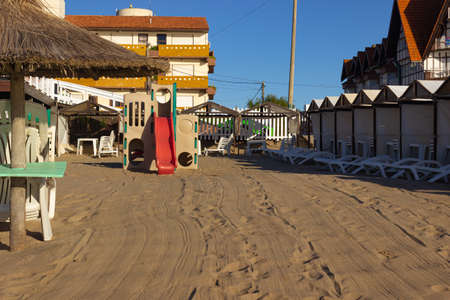 Playground without kids on the sand on a sunny day.のeditorial素材
