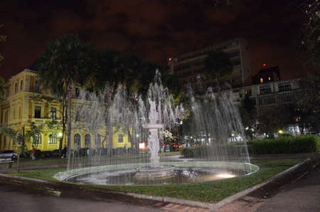 PraÃ§a da Liberdade (translated as Liberty Square) at Belo Horizonte in the state of Minas Gerais in Brazil at night with water fountain onの写真素材