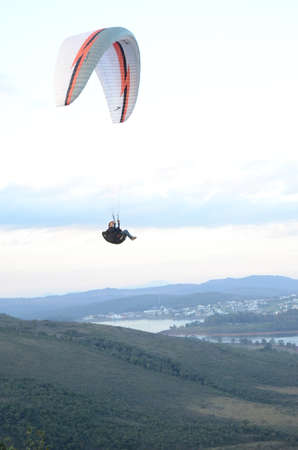 Paragliding at sun set in Topo do Mundo (translated to Top of the World) in Minas Geraisのeditorial素材