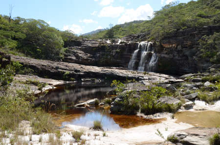 Waterfall in Rio Preto State Park in Minas Gerais at Cachoeira da Semper-Viva (translate to Always-Alive Waterfall, with is the popular name of Actinocephalus polyanthus)の写真素材