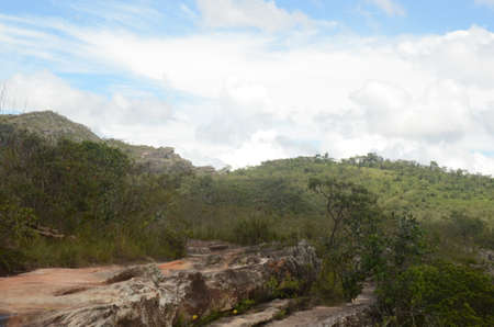 Hiking in the nature to the Waterfall in Milho Verde in the state of Minas Gerais called Cachoeira do Moinho (translated to Watermill Waterfall)の写真素材