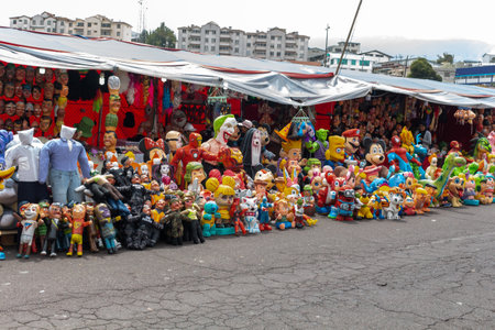Quito, Pichincha, Ecuador, December 30, 2019. Puppets to burn at the end of the year that represent the year that ends, figures of superheroes of film and television. Batman it dragon ballのeditorial素材