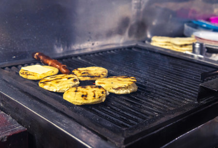 grill with arepas and chorizo. Typical food of Colombiaの写真素材