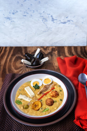 The fanesca is a traditional soup that is eaten in Ecuador at Easter and is accompanied by sweet figs with cheeseの写真素材
