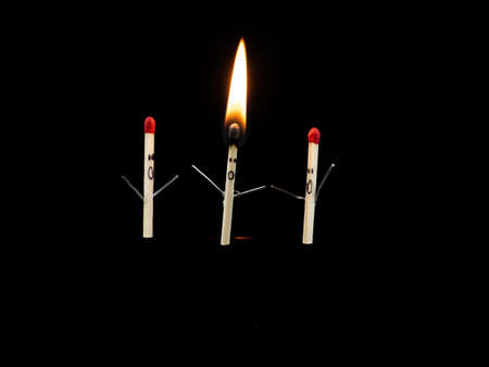 three burning match people with anxiety fear and headacheの写真素材