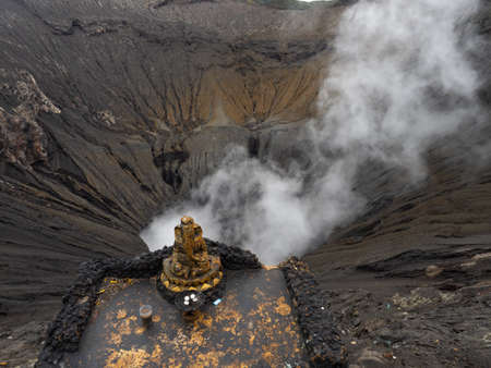 Mount Bromo Volcano inside the crater view on Java indonesia with Buddastatueの写真素材