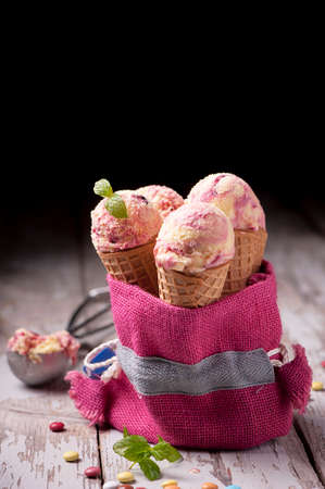 ice cream in waffles on woodの写真素材