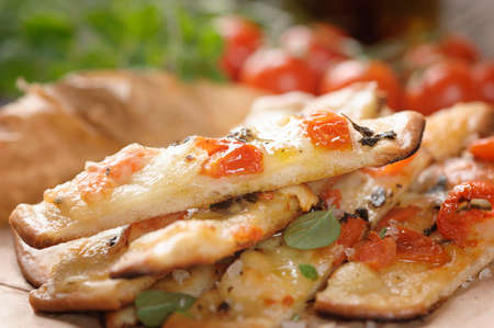 Over baked gourmet flatbread with roasted tomatoes