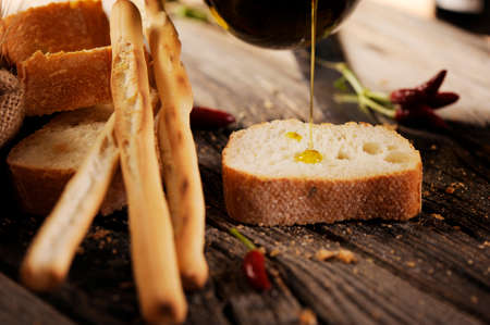 appetizer, appetizers, background, baguette, balsamic, balsamic vinegar, basil, bread, dip, dipped, dipping, dish, eating, ethnic, food, fresh, herbs, isolated, italian, oil, olive oil, sliced, slices, snack, starter, traditional, vinegar, whiteの写真素材