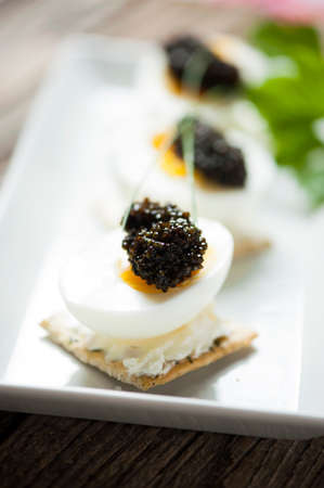 Caviar egg and crispy breadの写真素材