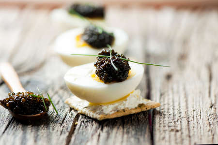 Caviar egg and crispy breadの写真素材