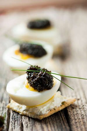 Caviar egg and crispy breadの写真素材
