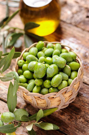green olives and oilの写真素材