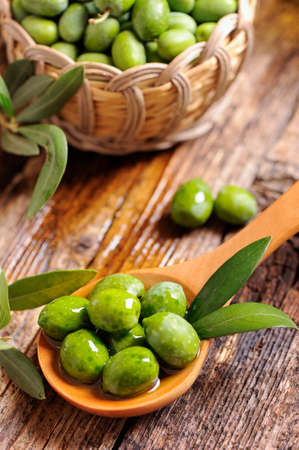 green olives and oilの写真素材