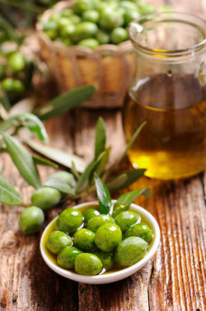 green olives and oilの写真素材