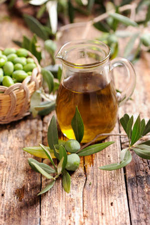green olives and oilの写真素材