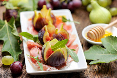 prosciutto ham and fresh figの写真素材